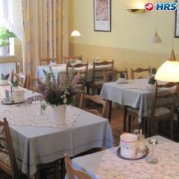 Sala colazione nel ristorante Elfi Pension Fotos