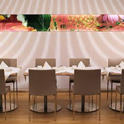 Salle du petit-déjeuner située dans le restaurant Novotel Muenchen City Fotos