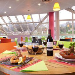 Sala de desayuno en el restaurante ibis Styles Paris Roissy Cdg (ex all seasons) Fotos