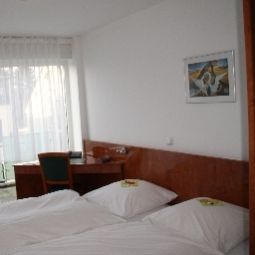 Номер Merkenich Garni Fotos