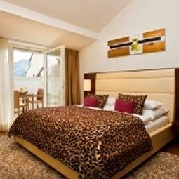Chambre avec balcon Iris Porsche Mondsee Hideaway Fotos