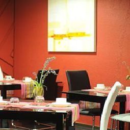 Salle du petit-déjeuner du Clocher Fotos