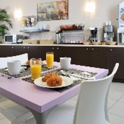 Комната для завтраков Séjours & Affaires Paris Malakoff Apparthotel Fotos