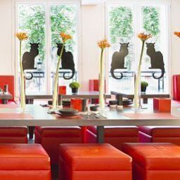 Salle du petit-déjeuner Le Chat Noir Fotos