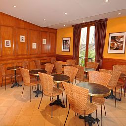 Sala de desayuno en el restaurante Pavillon Montmartre Fotos