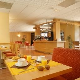 Salle du petit-déjeuner située dans le restaurant Appart Hotel du Parc Residence Hoteliere Fotos