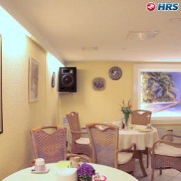 Sala de desayuno en el restaurante Hecke Apartmenthaus Fotos