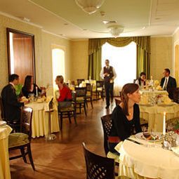 Sala de desayuno en el restaurante Agava Fotos