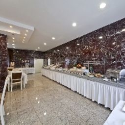 Salle du petit-déjeuner Unique Novum Fotos