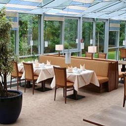 Sala colazione nel ristorante Gästehaus am RPTC Garni Fotos