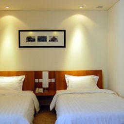 Room Traveler Inn Huaqiao Fotos