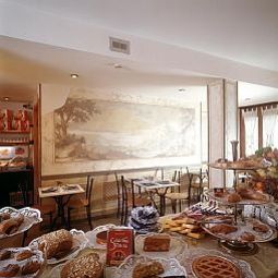 Sala colazione nel ristorante Mastino Fotos