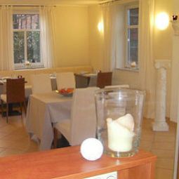 Salle du petit-déjeuner Weserlounge Garni Fotos