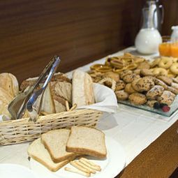 Зал для завтрака As Hotel Cambiago Fotos