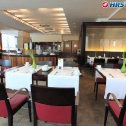 Sala de desayuno en el restaurante Barcelo Cologne City Center Fotos