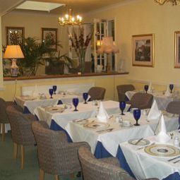Salle du petit-déjeuner située dans le restaurant Beech House Fotos