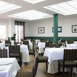 Salle du petit-déjeuner située dans le restaurant Cortijo Chico Fotos