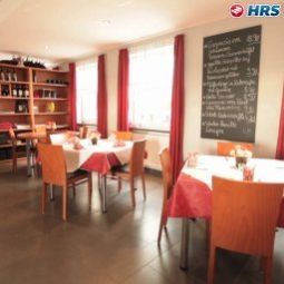 Salle du petit-déjeuner située dans le restaurant more Fotos