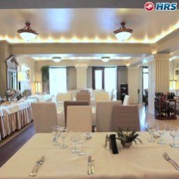 Salle du petit-déjeuner située dans le restaurant Arc de Triomphe by Residence Hotels Fotos