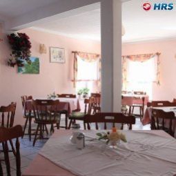 Sala colazione nel ristorante Hansen Pension Fotos