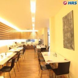 Salle du petit-déjeuner située dans le restaurant Husa de la Couronne Fotos