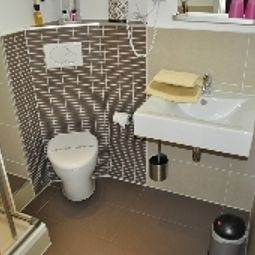 Cuarto de baño Sandmanns Hotel & Lounge Fotos