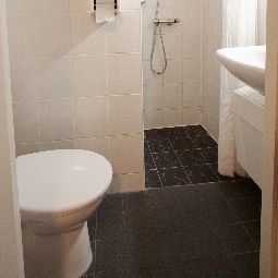 Cuarto de baño Damrak Inn Fotos