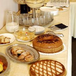 Salle du petit-déjeuner située dans le restaurant Veio Park Hotel Fotos