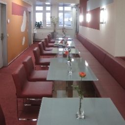 Sala de desayuno en el restaurante Somnia Fotos