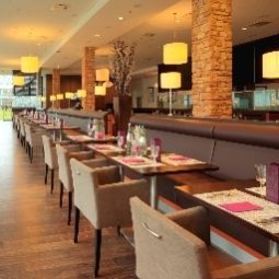 Salle du petit-déjeuner située dans le restaurant Worldhotel - The Rilano München Fotos