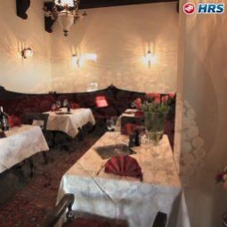 Salle du petit-déjeuner située dans le restaurant Relais Bon homme Fotos