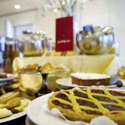 Sala colazione nel ristorante Mercure Rimini Artis Fotos