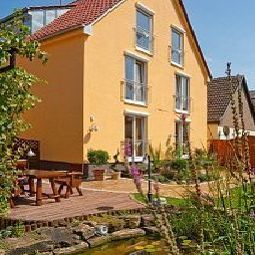 Фасад Krug Gästehaus Fotos