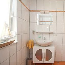 Ванная Krug Gästehaus Fotos
