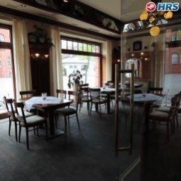 Salle du petit-déjeuner située dans le restaurant Specht Fotos