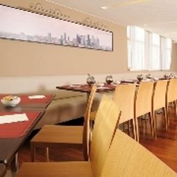 Salle du petit-déjeuner Residhome Asnieres Apparthotel Fotos