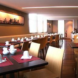 Salle du petit-déjeuner Residhome Asnieres Apparthotel Fotos