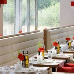 Salle du petit-déjeuner Van der Valk Airporthotel Fotos