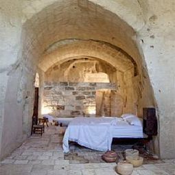Номер Sextantio Albergo Diffuso Le Grotte della Civita Fotos