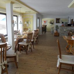 Frühstücksraum im Restaurant Alpina Fotos