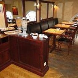 Sala colazione nel ristorante Malon Fotos