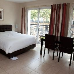 Pokój typu junior suite Villa Carnot luxury apartments Fotos