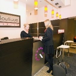 Reception Boutique Hotel's I Fotos