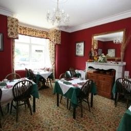 Salle du petit-déjeuner située dans le restaurant Barrington Guest House Fotos