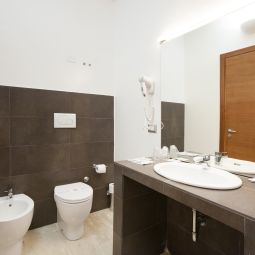 Badezimmer Oasi Village Hotel & Resort Fotos