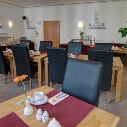 Salle du petit-déjeuner Sechzehn Fotos