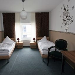 Zimmer Ikar Pension Fotos
