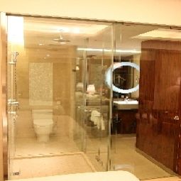Badezimmer Han's Hotel & Apartment Ningbo YinYi World Center Fotos