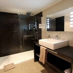 Salle de bains Best Western Plus Le Colisée Hotel & Spa Fotos