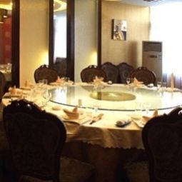 Salle du petit-déjeuner située dans le restaurant NT 0513 Business Hotel Fotos